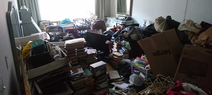 Room full of junk at Flat clearance job in Knightsbridge
